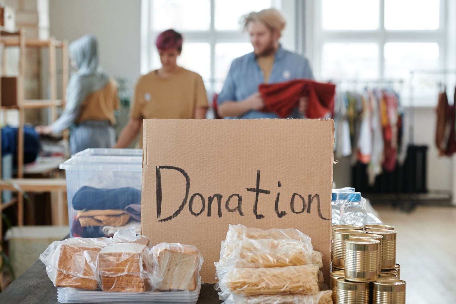 Food, clothing and household supplies arranged for community distribution