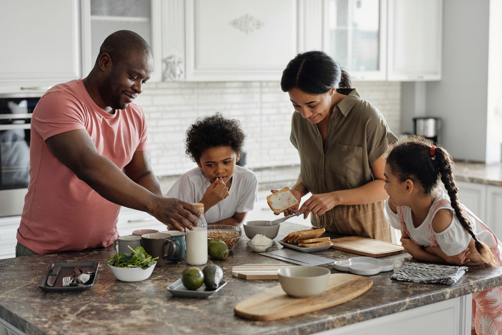 A family preparing a meal together in the kitchen